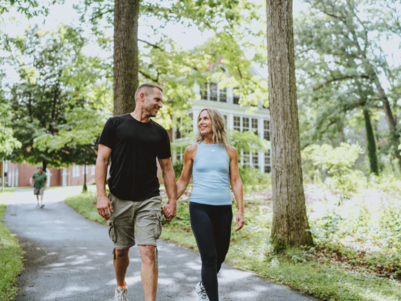 A couple on a walking trail at Gideon Putnam